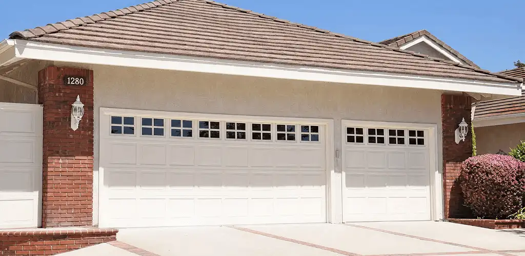 Residential garage door repair service for a double garage door in Raleigh, NC