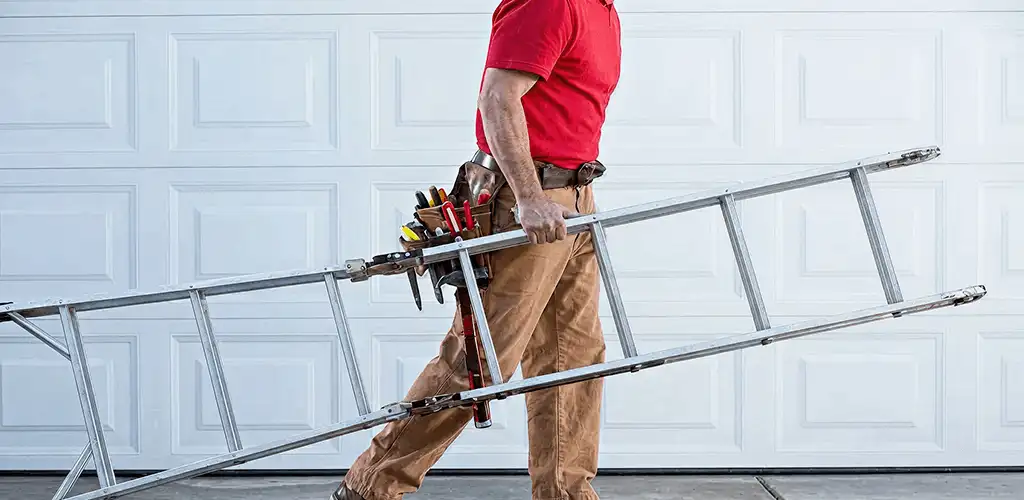 Garage door repair technician arriving with tools and ladder in Raleigh, NC