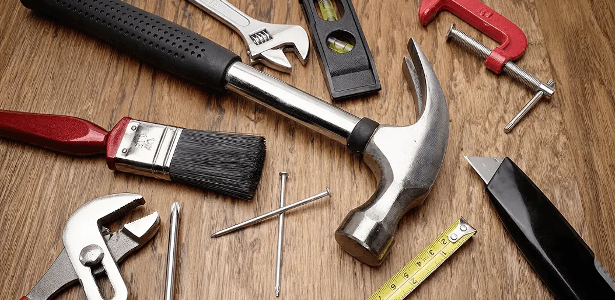 Handyman tools laid out for home repair and maintenance work in Raleigh, NC