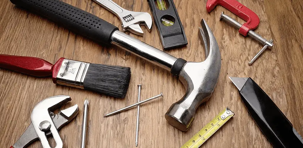 Handyman tools laid out for home repair and maintenance work in Raleigh, NC